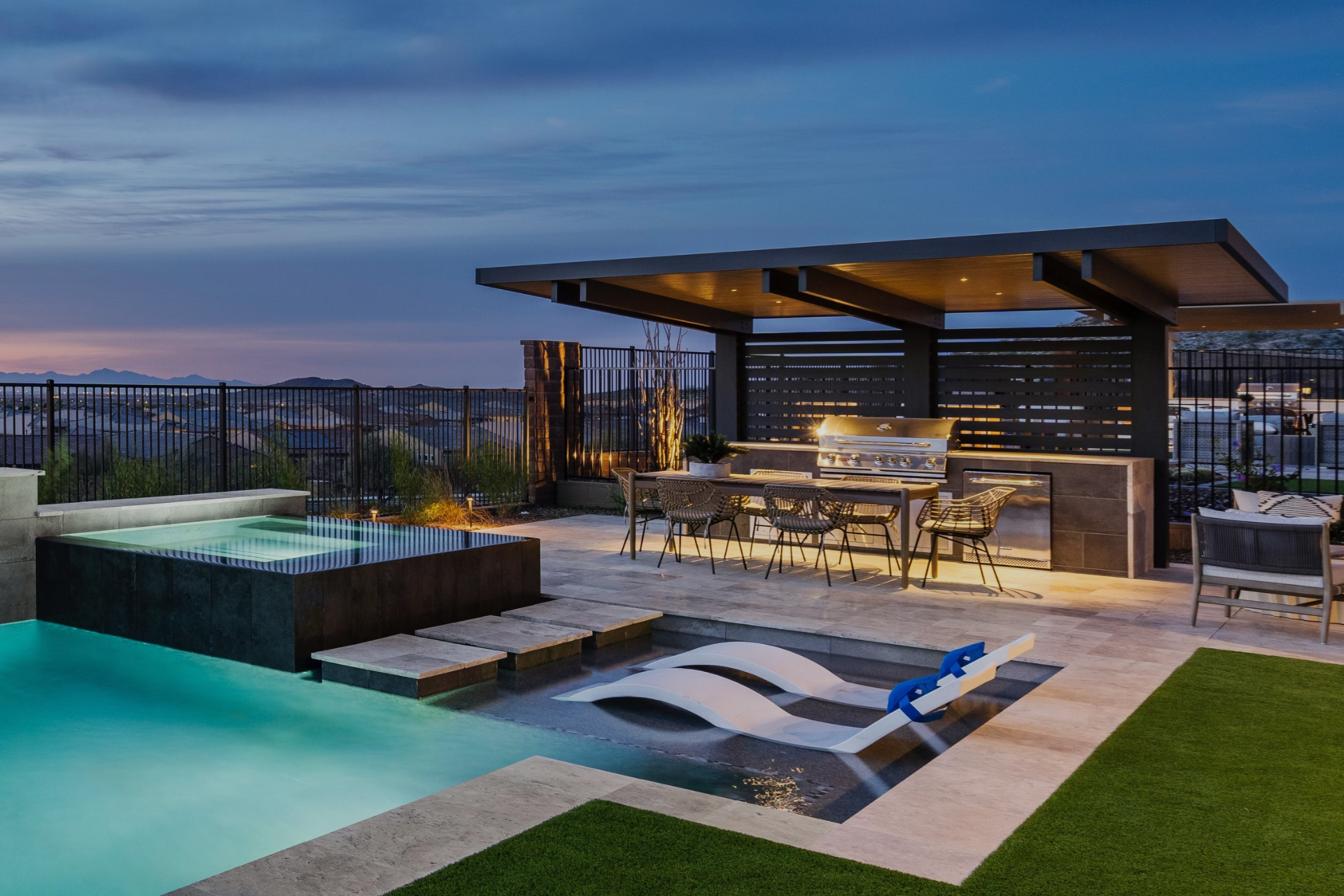 Luxury outdoor living space with custom shade structure by Cabana Theory