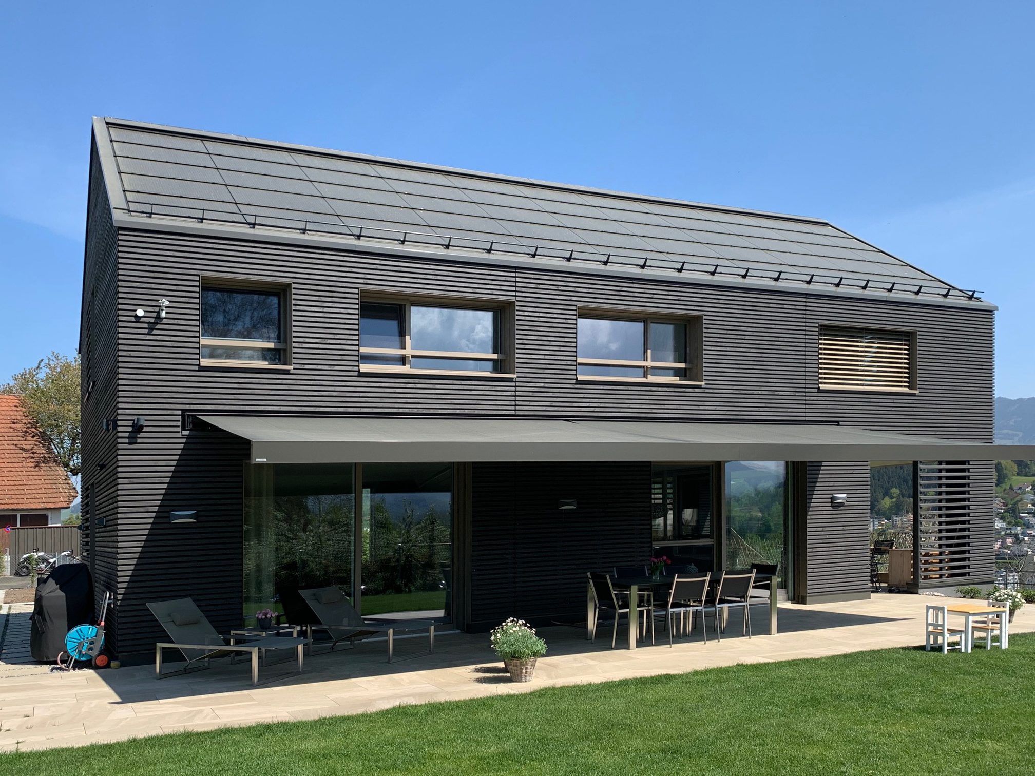 Motorized retractable awning installed on Texas patio — Cabana Theory