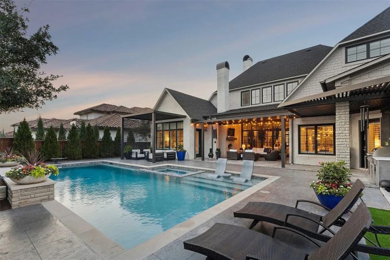 Fixed slat pergola attached to luxury home with pool — Robertson project by Cabana Theory