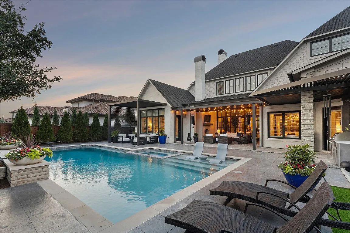 Fixed slat pergola attached to luxury home with pool — Robertson project by Cabana Theory