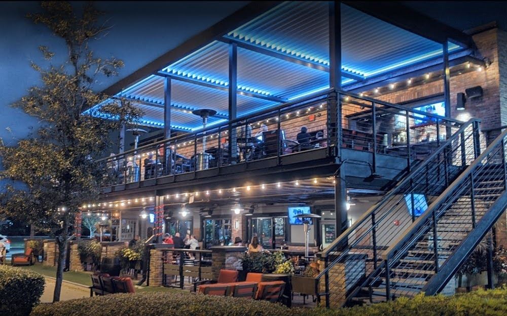Commercial rooftop restaurant with motorized louvered pergola and LED lighting | Cabana Theory