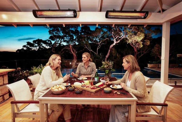Outdoor dining table set for fall entertaining on a covered patio | Cabana Theory